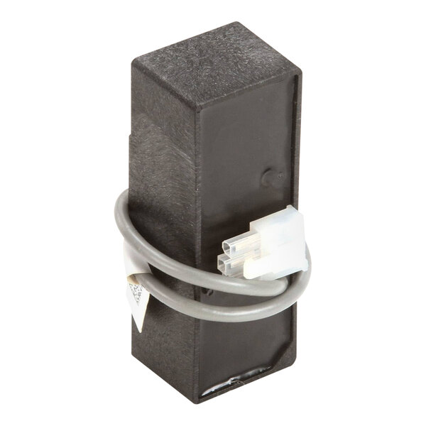 A black rectangular Scotsman IR sensor with a cable.