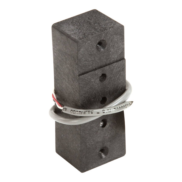 A black rectangular Scotsman IR sensor with a white cable.