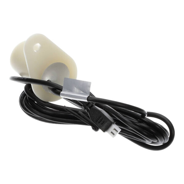 A black cable with a white plastic holder and a white tag with a black wire.
