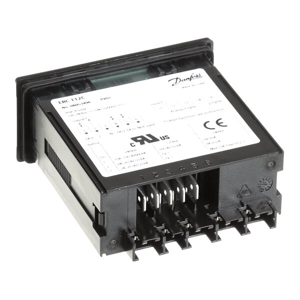 A black electronic device with a white label that reads "Delfield 000-CZ0-0252-S Assy, Ctl, Frzr"