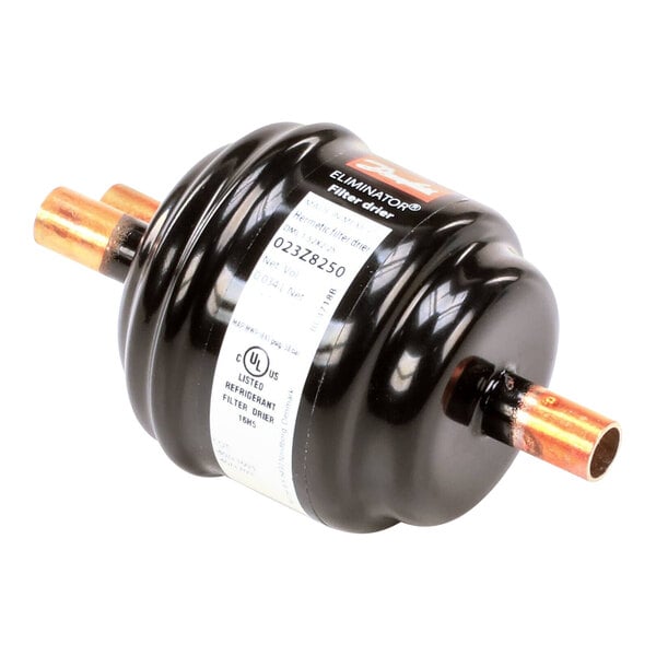 A black and copper filter drier for a Beverage-Air refrigeration compressor.