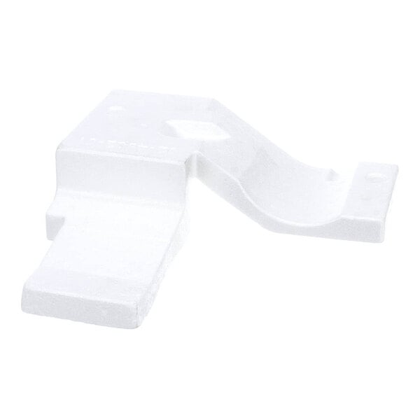 A white rectangular plastic piece with a hole in the middle.