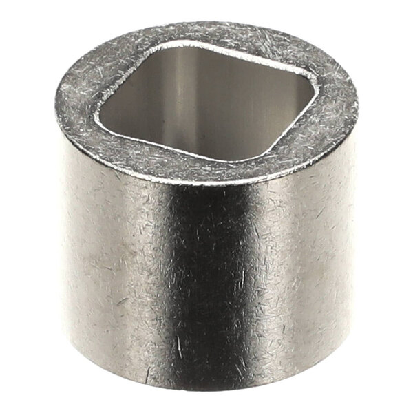 A stainless steel Scotsman drive coupling with a hole in it.