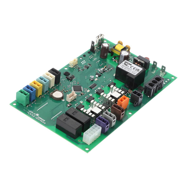 A Traulsen power module circuit board with various colored connectors.
