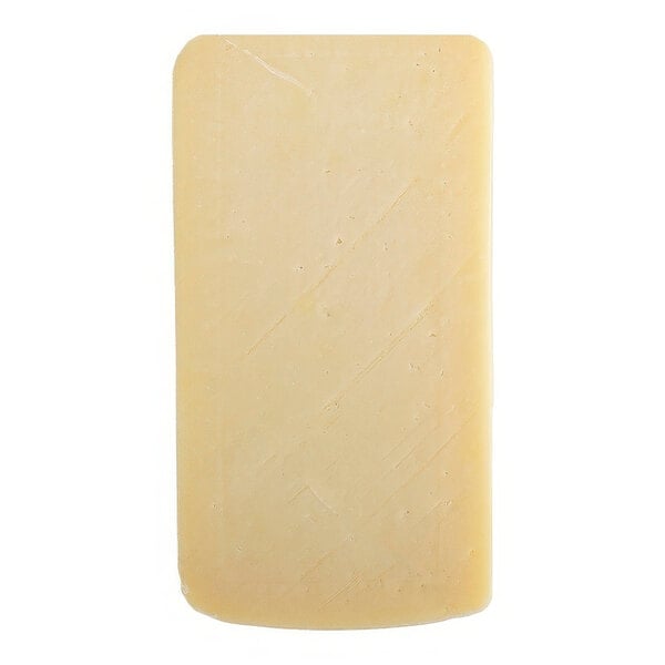 A rectangular white cheese block.