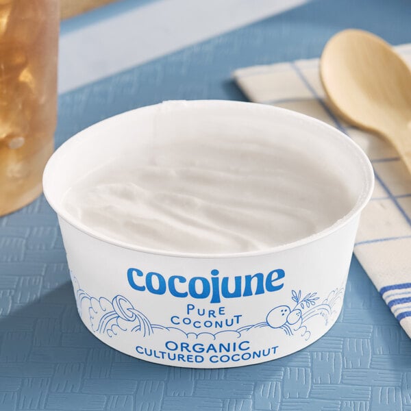 A container of Cocojune organic cultured coconut dairy-free yogurt alternative.