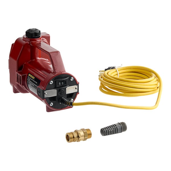 A portable water transfer pump with a red housing, yellow power cord, and included hose adapters.
