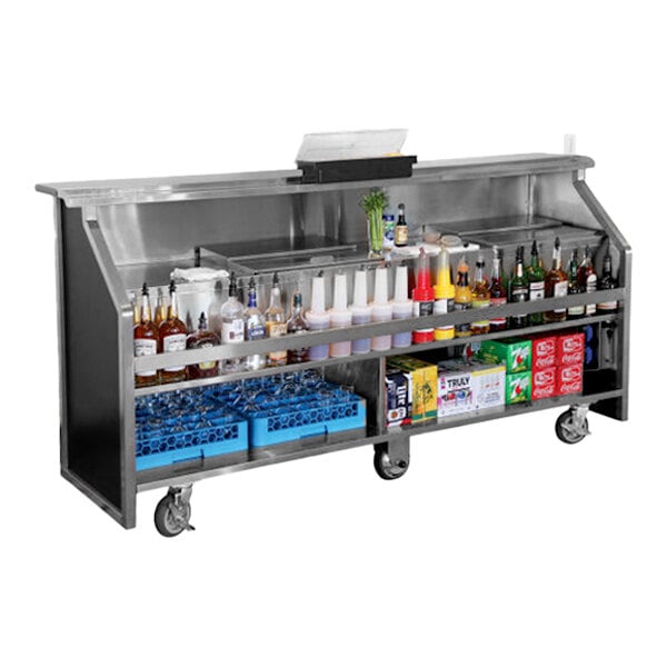 A large portable bar with a black laminate and stainless steel finish, featuring shelves stocked with bottles, cups, and supplies, and equipped with ice bins and wheels for mobility.