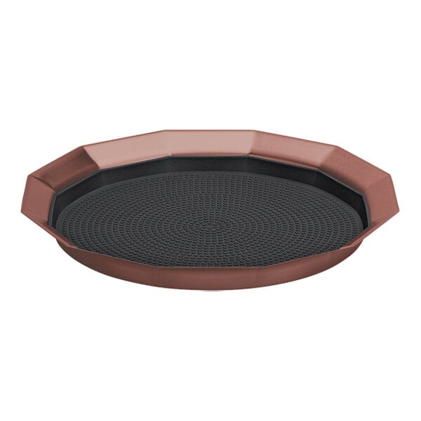 A rose gold 12-sided serving tray with a removable black non-slip insert.