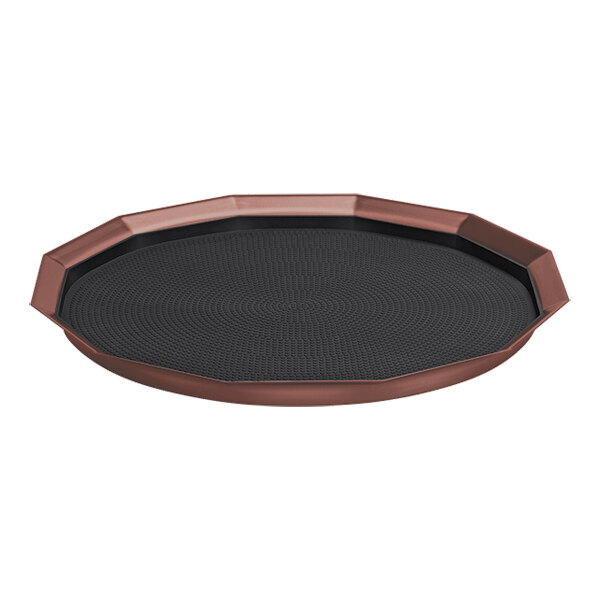A 16-inch rose gold 12-sided serving tray with a removable non-slip black insert.