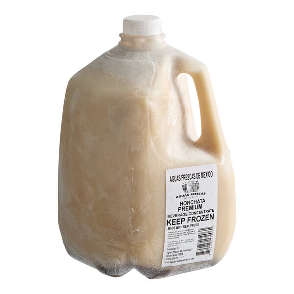 A gallon jug of Aguas Frescas de Mexico Horchata beverage concentrate with a white cap and product label.