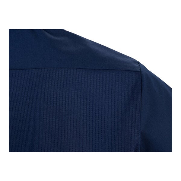 A close-up view of the back shoulder area of a navy blue short sleeve work shirt.