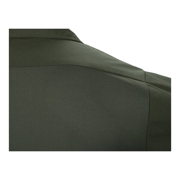 A close-up view of the back shoulder area of an olive green short sleeve work shirt.