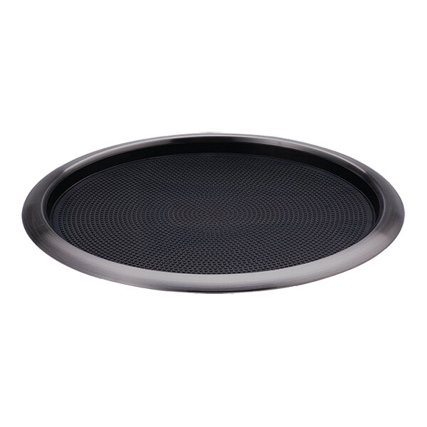 A round dark tungsten serving tray with a removable non-slip insert.