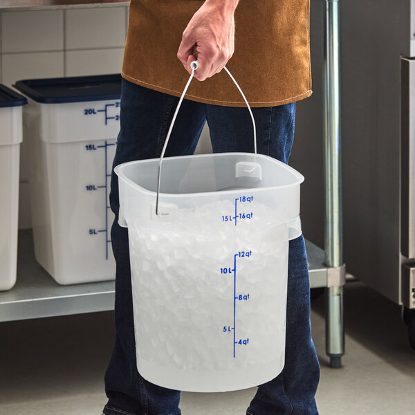 A translucent 18-quart round food storage pail with a bail handle, partially filled with ice.