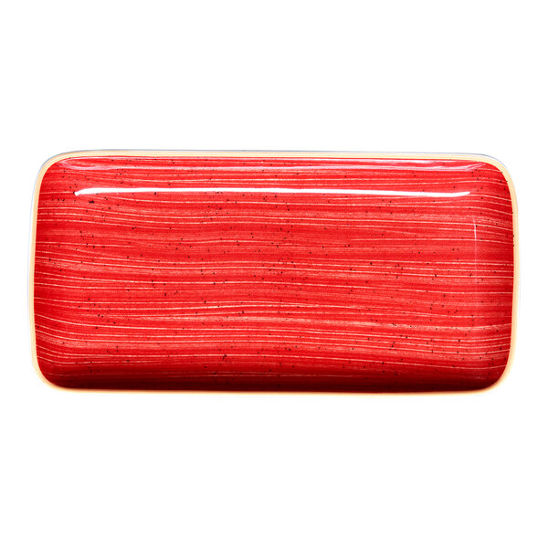 A red rectangular porcelain plate with a coupe design and subtle horizontal lines.