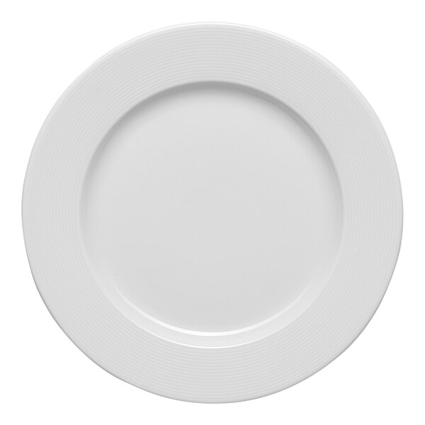A white round porcelain plate with an embossed wide rim.