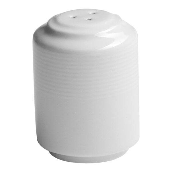 A white embossed porcelain salt shaker with a cylindrical shape and three holes on top.