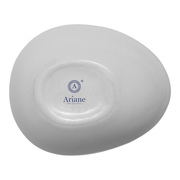 A small, white, slanted porcelain coupe bowl with the Ariane logo on the bottom.