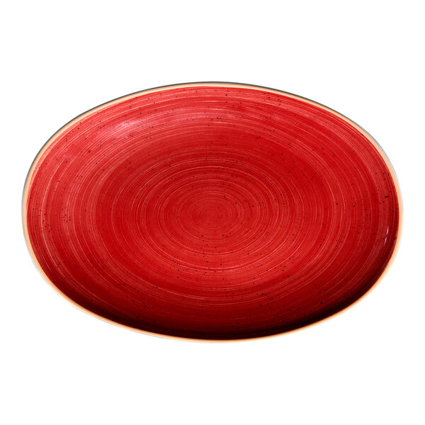 An oval red porcelain plate with a coupe design.