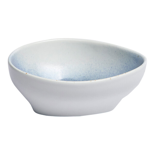 A small blue and white ombre triangular porcelain coupe bowl.