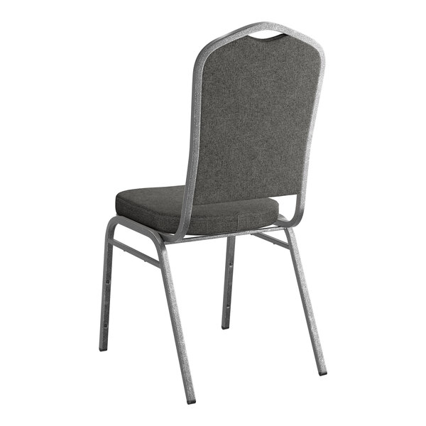 A stackable banquet chair with gray fabric upholstery and a silver vein metal frame.