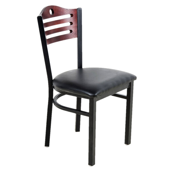 A black metal chair with a cushioned seat and a mahogany-finished wood bistro backrest.