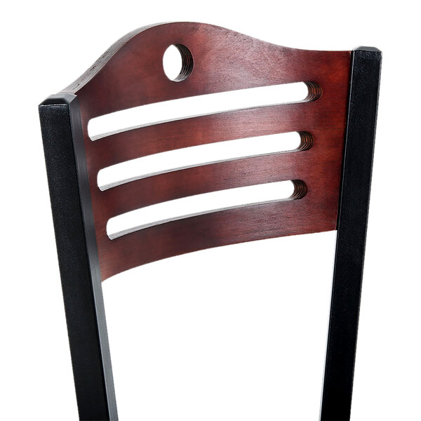 A wooden bistro chair backrest with a mahogany finish and three horizontal cutouts.