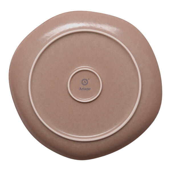 An irregular round gold and brown porcelain flat plate with a smooth finish.