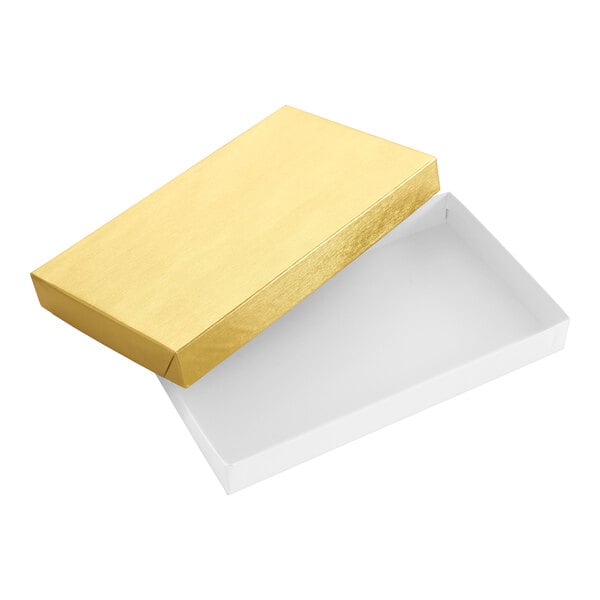 A rectangular two-piece candy box with a gold lid and a white base.