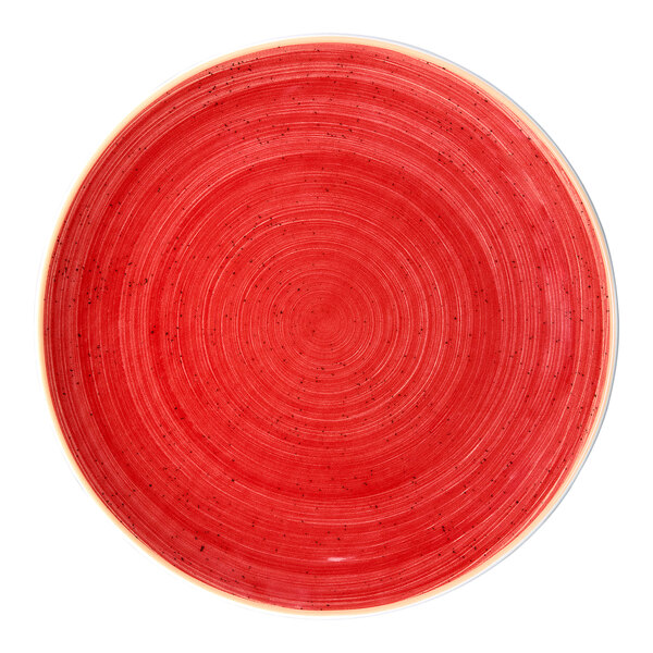 A round, rimless red porcelain plate with a twister pattern.
