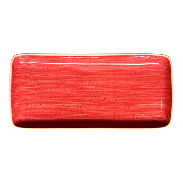 A large red rectangular porcelain plate with a coupe design.