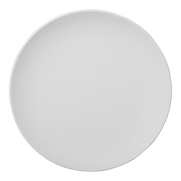 A round, warm white, rimless porcelain coupe plate.