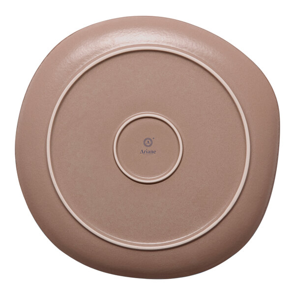 A gold and brown irregular round porcelain flat plate with a slightly raised rim.