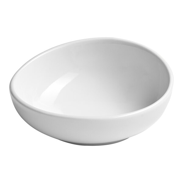 A small, round, slanted white porcelain bowl.