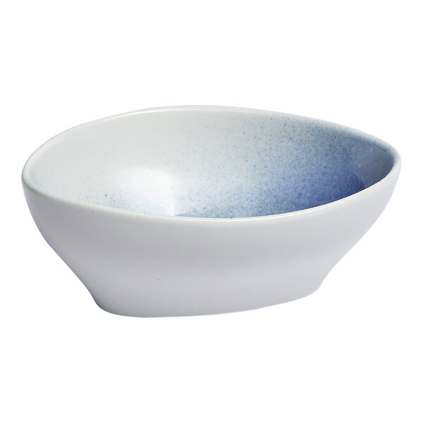 A blue and white ombre triangular porcelain coupe bowl.