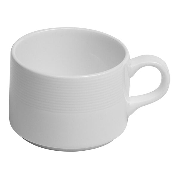 A white stackable embossed porcelain tea cup with a handle.