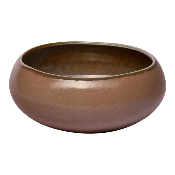 A gold and brown organic round porcelain bowl with a glossy finish.