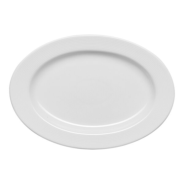 An oval white porcelain platter with an embossed wide rim.