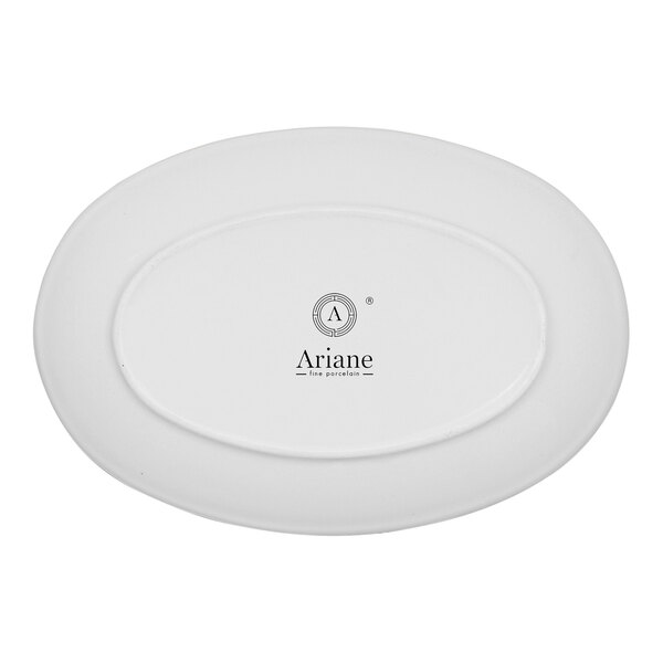 An oval, warm white porcelain rimless coupe plate with the Ariane logo on the bottom.