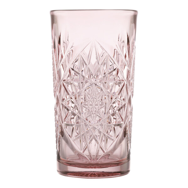 A pink, intricately patterned 16 oz. cooler glass.