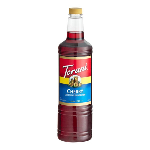 A 1-liter plastic bottle of Torani Cherry flavoring syrup.
