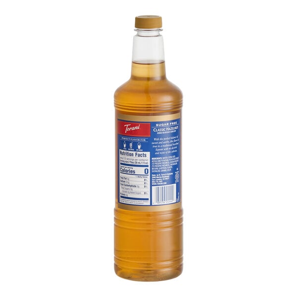 A 1-liter plastic bottle of Torani Sugar-Free Classic Hazelnut Flavoring Syrup.