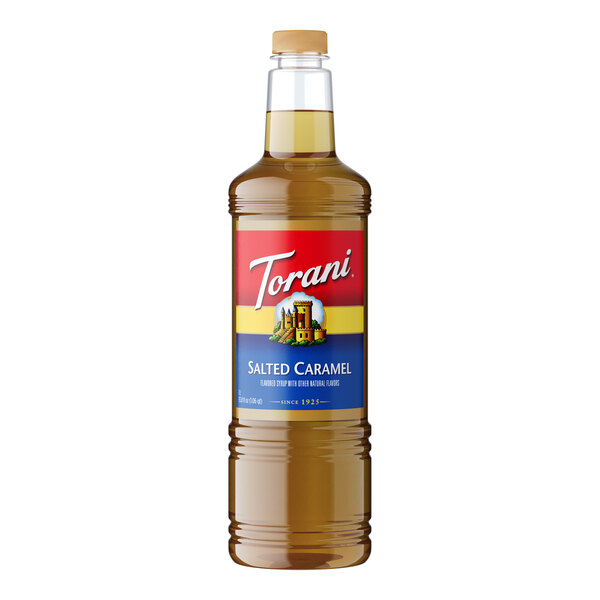 A plastic bottle of Torani Salted Caramel flavoring syrup with brown liquid inside.