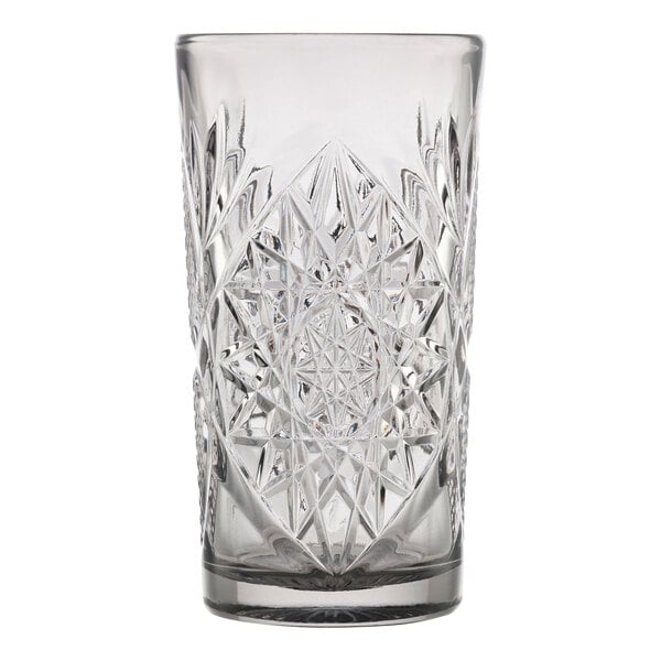 A clear, intricately patterned 16 oz. graphite cooler glass.