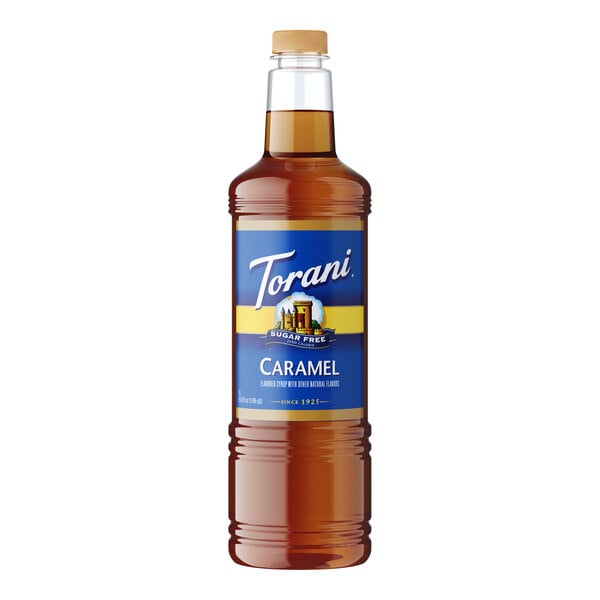 A close up of a Torani Sugar-Free Caramel Flavoring Syrup plastic bottle with a blue label.