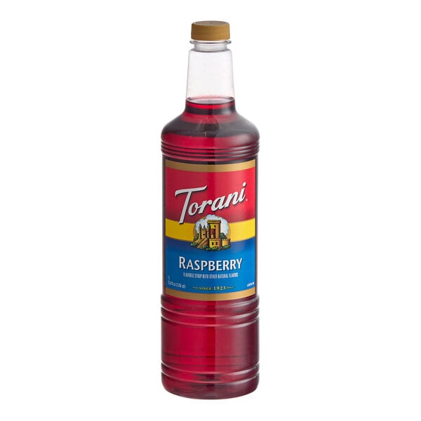 A 1-liter plastic bottle of Torani Raspberry flavoring and fruit syrup.