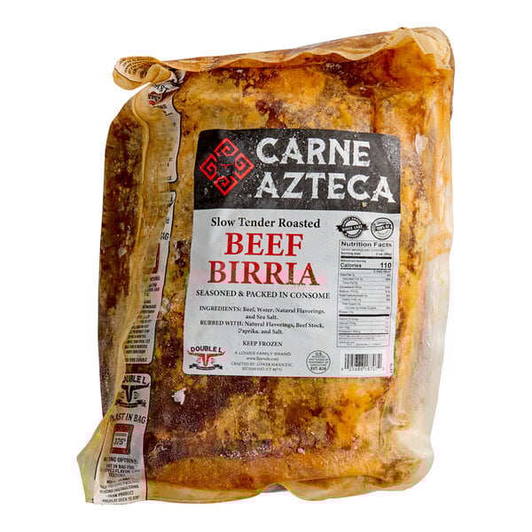 A vacuum-sealed package of Carne Azteca slow tender roasted beef birria, seasoned and packed in consomme.