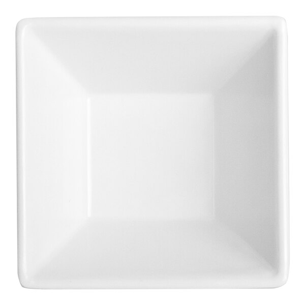 A small, white, square melamine bowl.