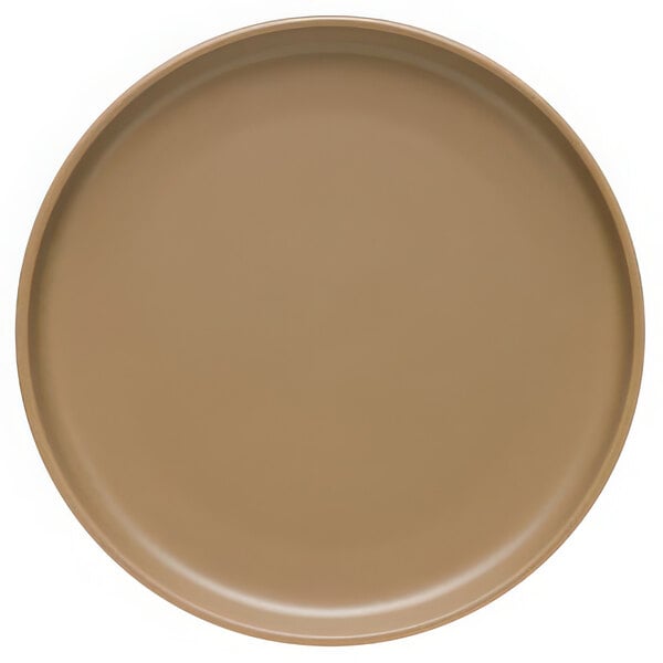 A round, sand-colored satin matte porcelain flat coupe plate.